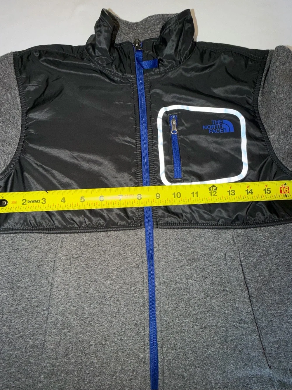 The North Face Kids Black and Gray Jacket with Blue Zip. C13,EMP
